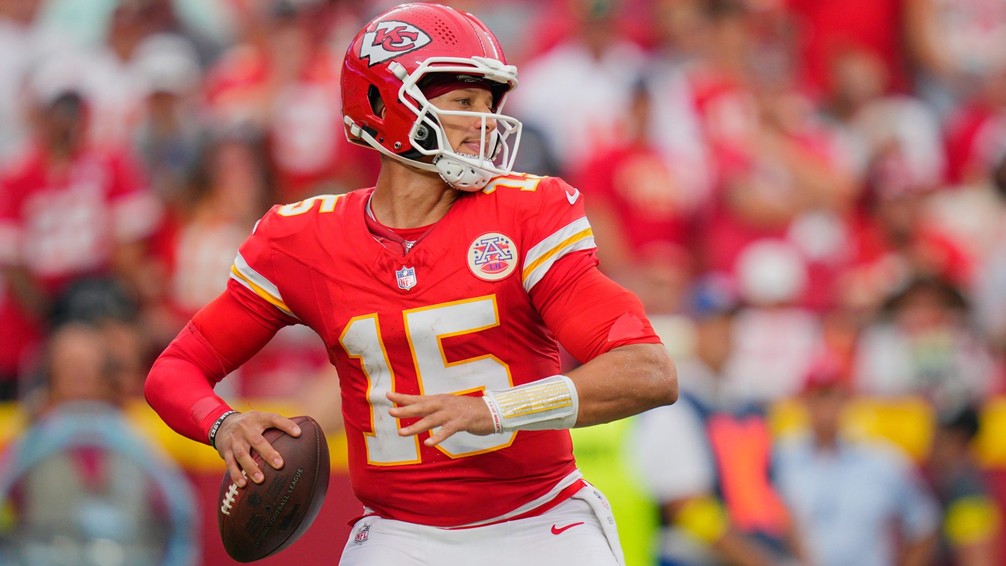Patrick Mahomes stands in the pocket and gets ready to throw the football
