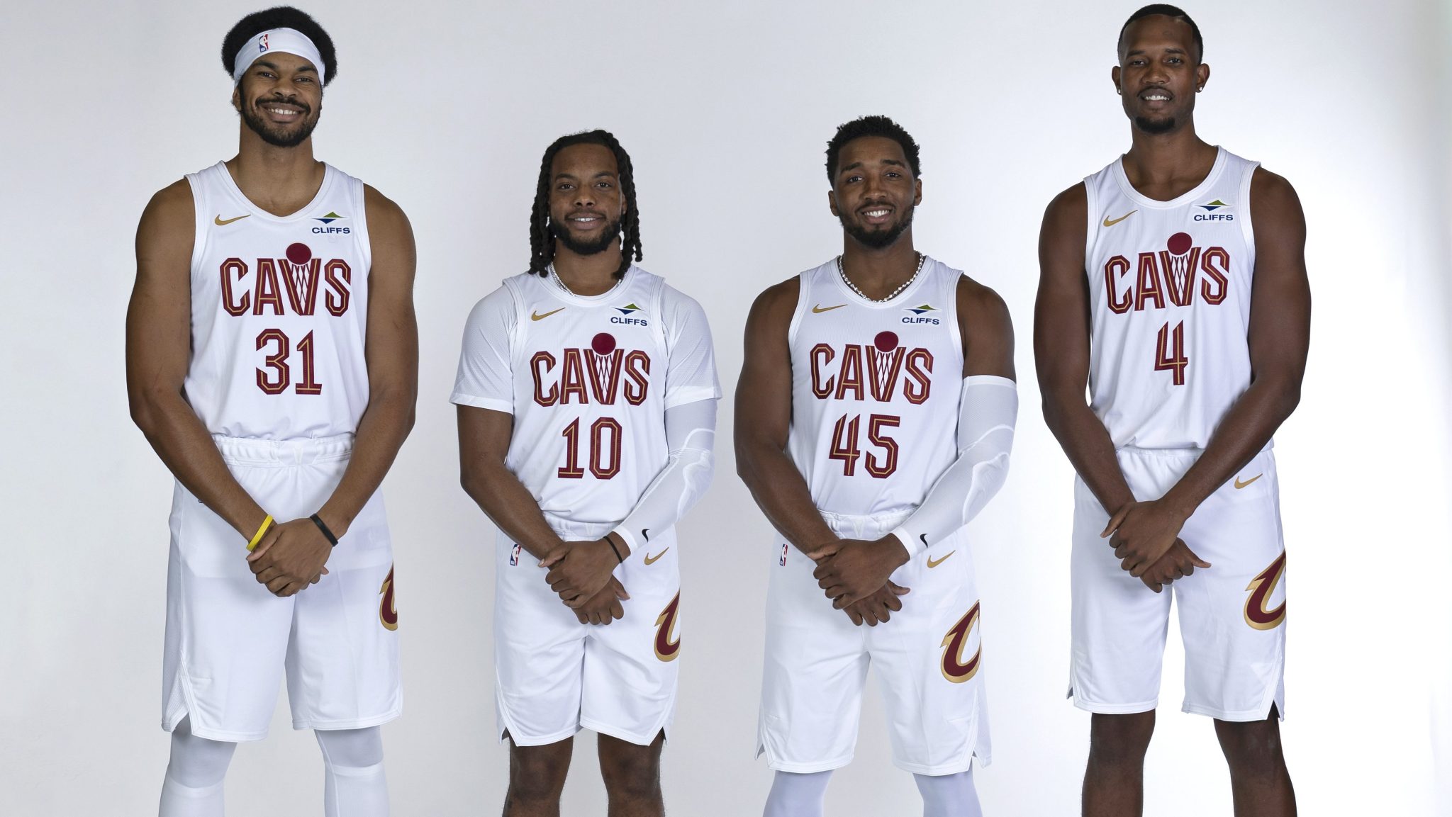 Jarrett Allen, Donovan Mitchell, Darius Garland and Evan Mobley of the Cleveland Cavaliers poses for a portrait.