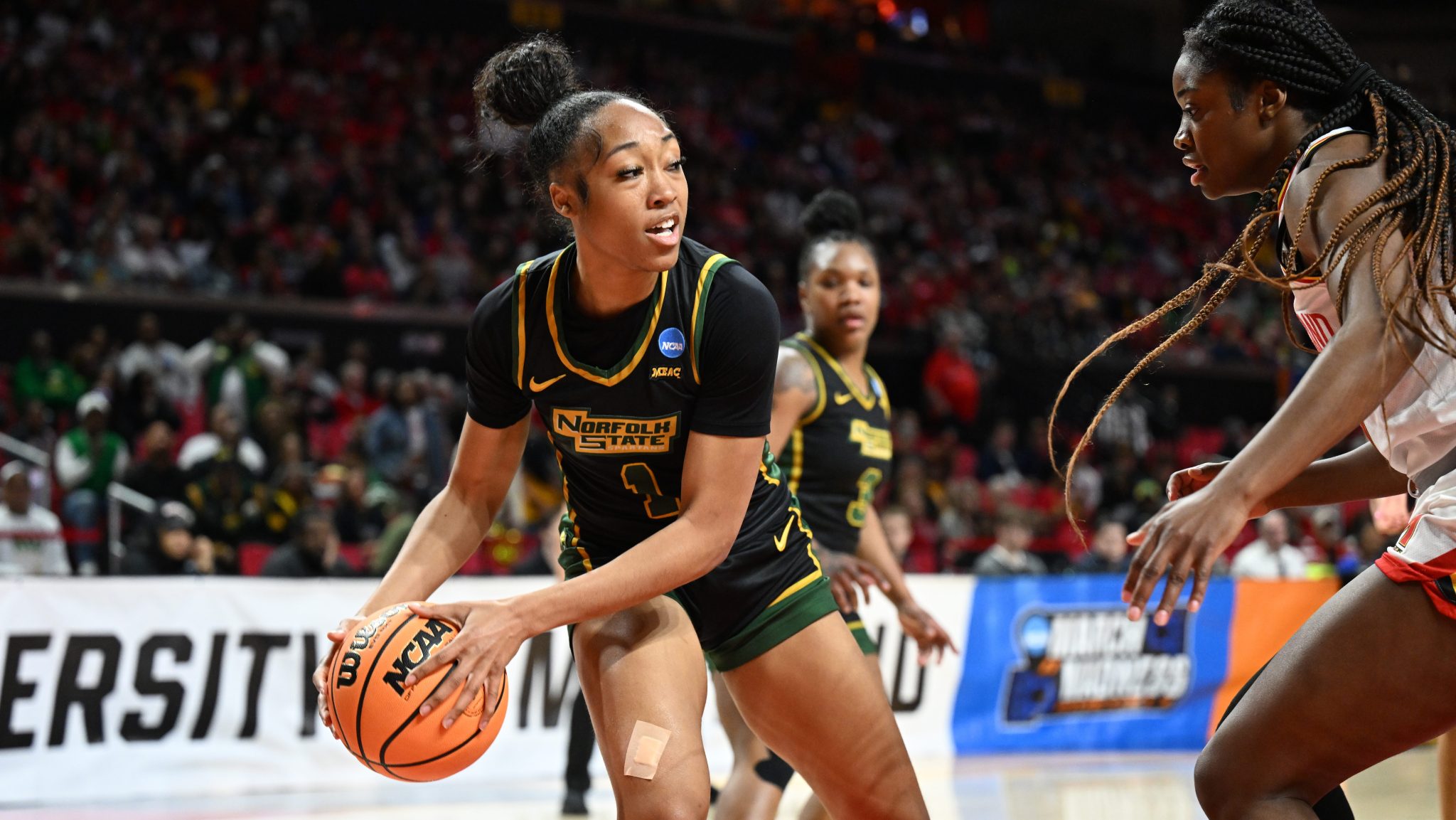 Da'Brya Clark of the Norfolk State Spartans looks to pass during the first round of the NCAA women's basketball tournament on March 22, 2025, at Xfinity Center in College Park, Maryland.