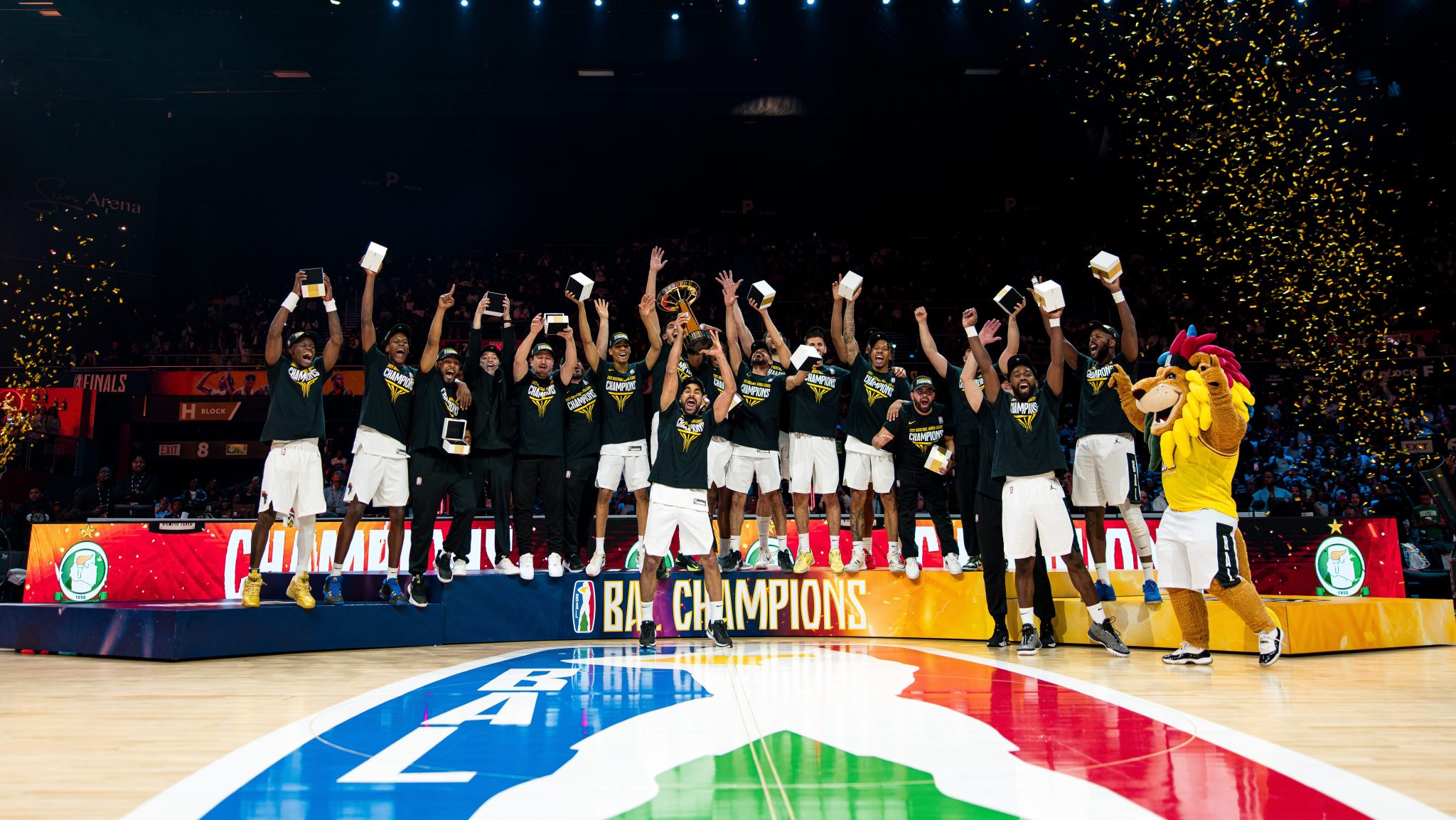 Al Ahli Tripoli celebrates on the court after winning the 2025 BAL championship