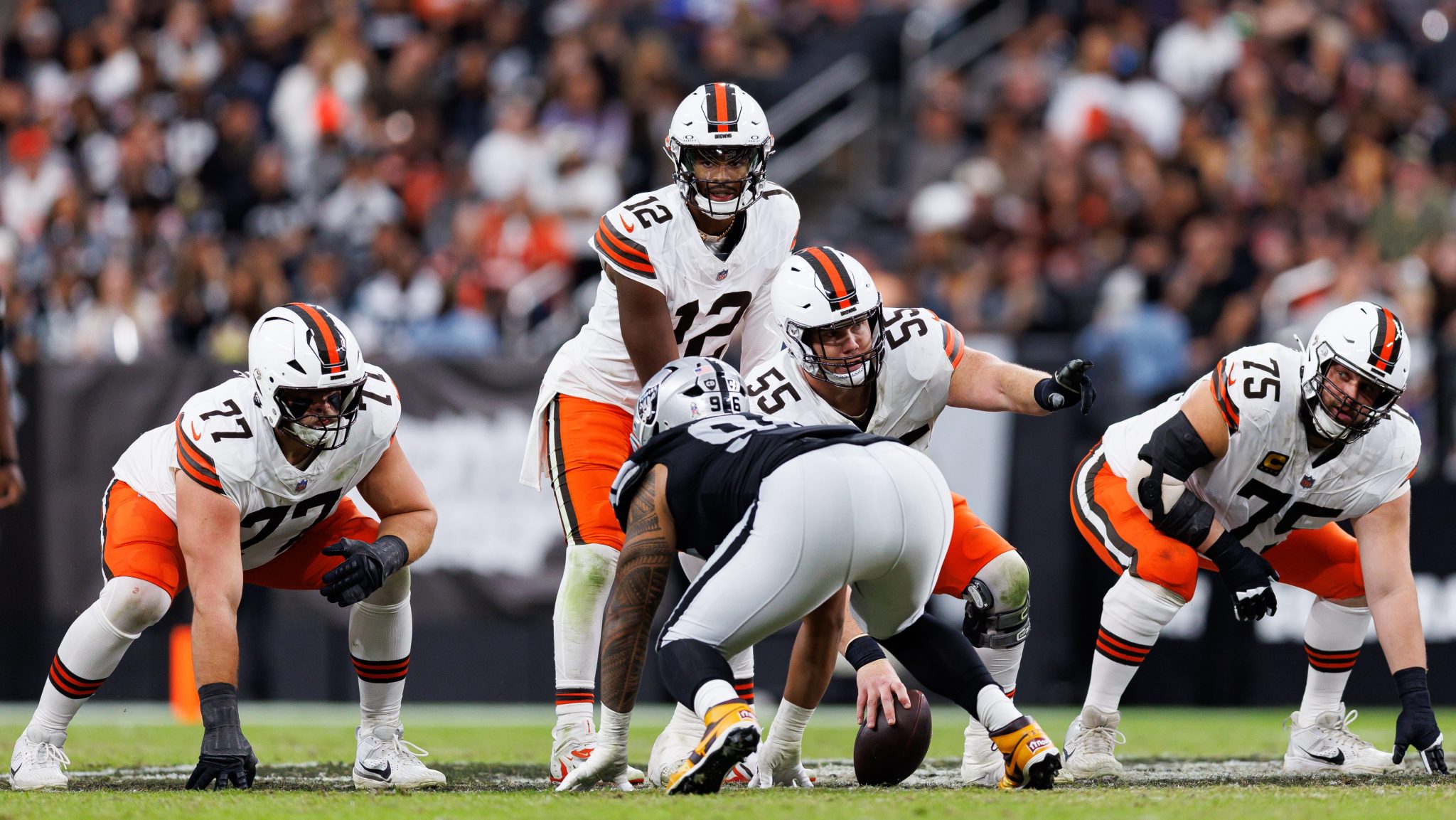 Shedeur Sanders calls a play at the line of scrimmage