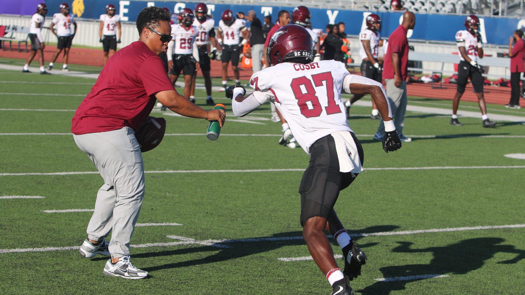 North Carolina Central offensive analyst Jennifer King works with a player.