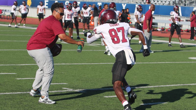 North Carolina Central offensive analyst Jennifer King works with a player.