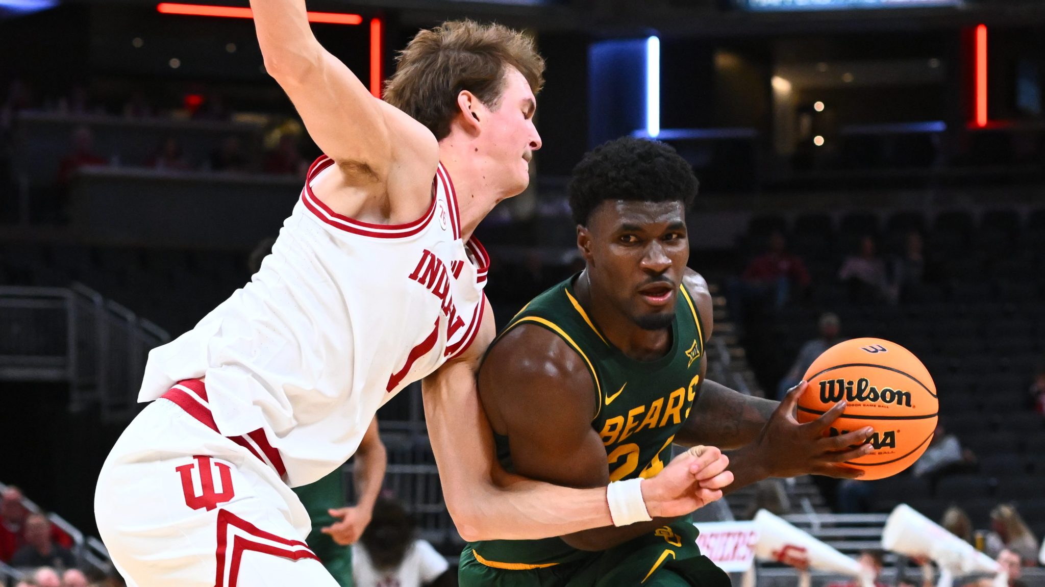 Baylor guard Tounde Yessoufou (right) advances the ball as Indiana forward Reed Bailey (left) defends in the second half of a game at Gainbridge Fieldhouse on Oct. 26 in Indianapolis.