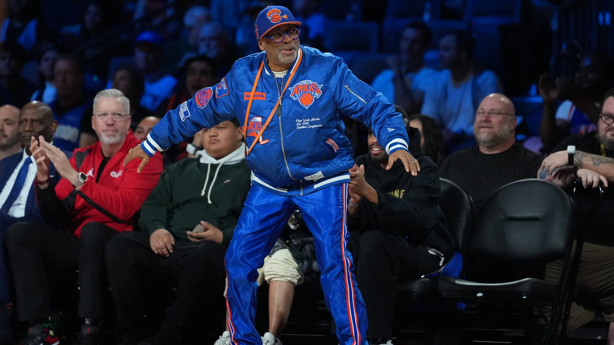 New York Knicks fan Spike Lee reacts courtside to a play on the court