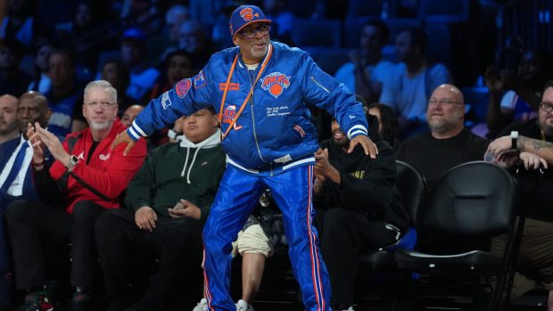 New York Knicks fan Spike Lee reacts courtside to a play on the court