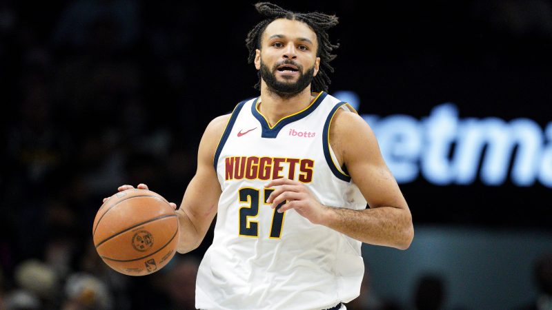 Jamal Murray dribbles the ball