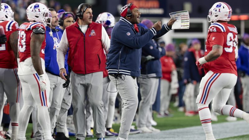 Tight ends / passing game coordinator Thomas Brown instructs from the sidelines