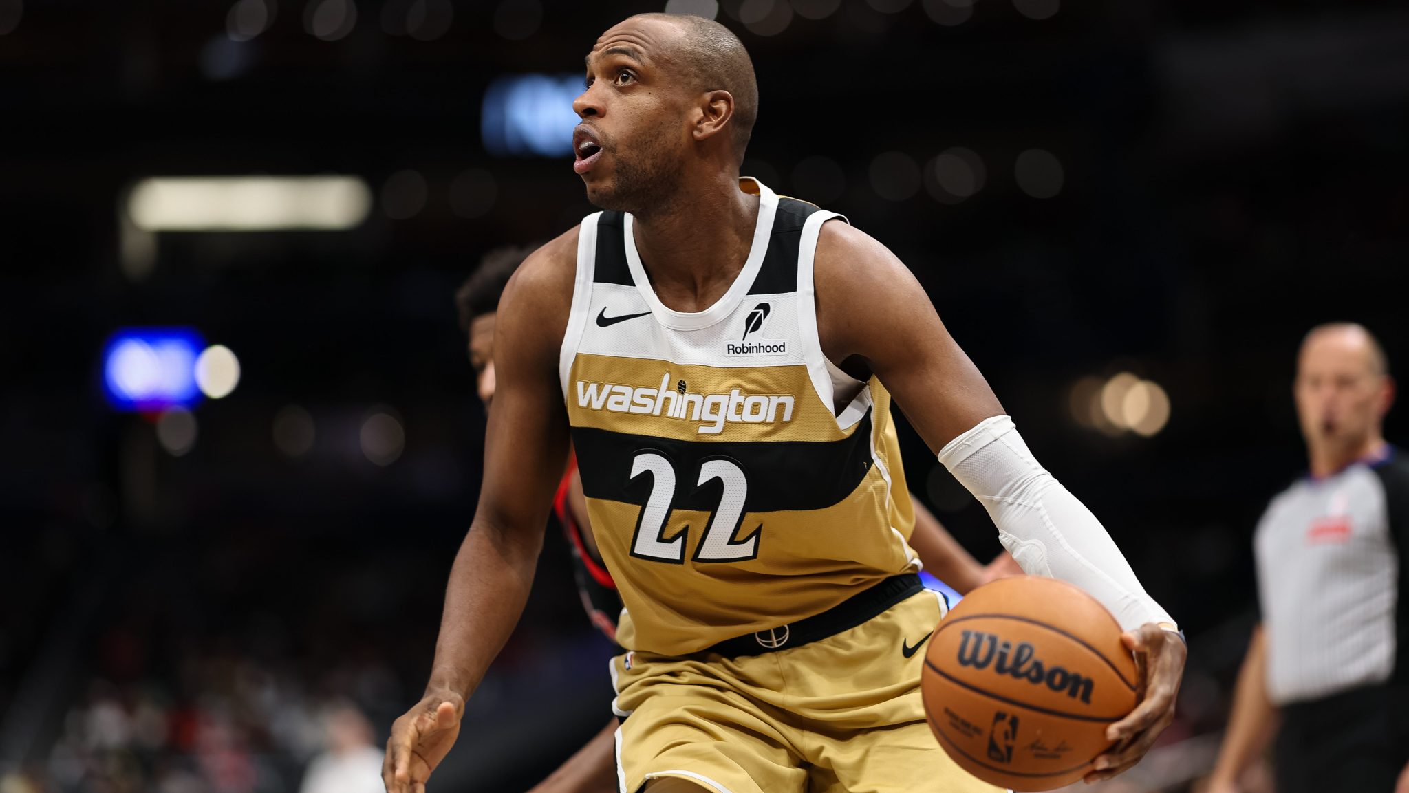 Khris Middleton handles the ball