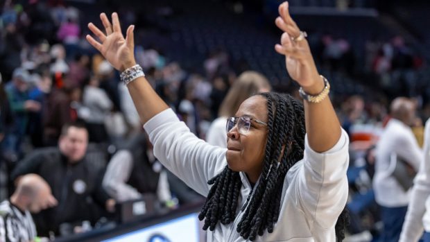 Mississippi head women's basketball coach Yolett McPhee-McCuin salutes the fans after an upset win over Vanderbilt on Jan. 30, 2026, in Birmingham, Alabama.
