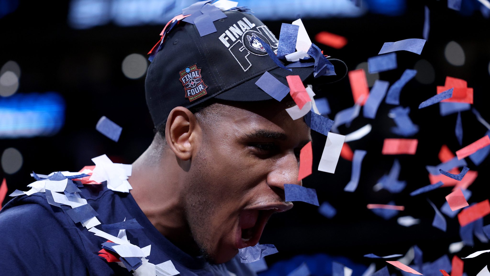 With confetti falling on him, Tarris Reed Jr. celebrates.