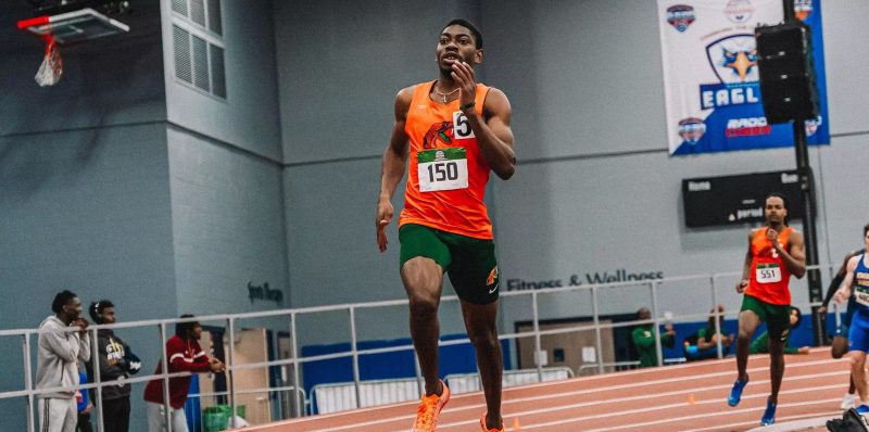 Kirk Dawkins runs in a track meet