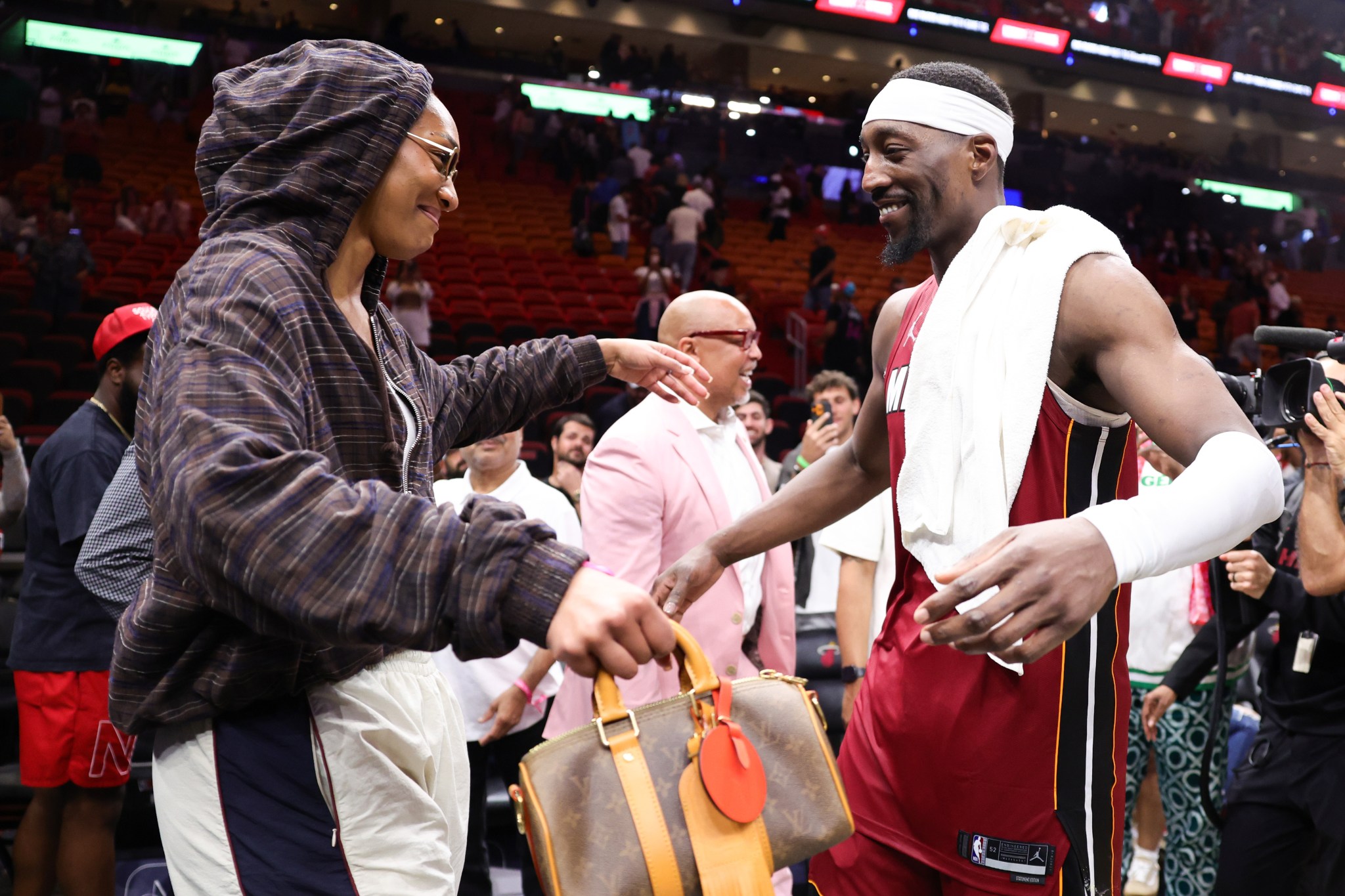 A'ja Wilson and Bam Adebayo embrace