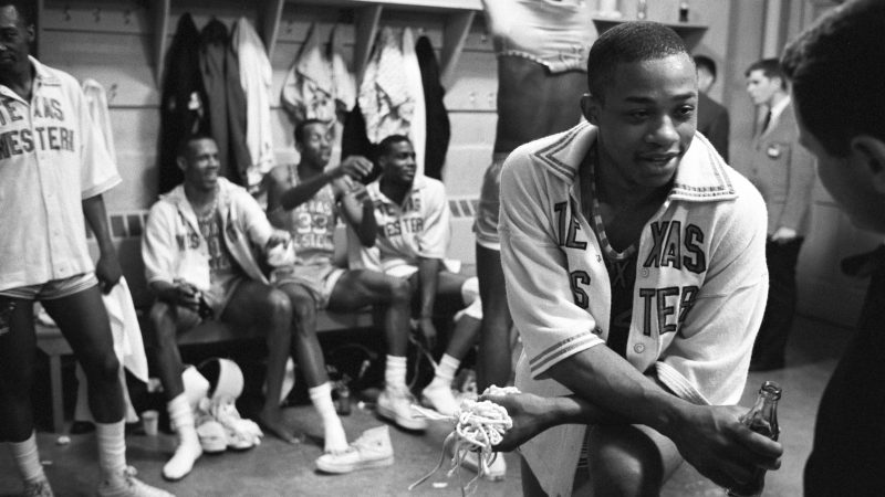 Texas Western (UTEP) players celebrate in the locker roomafter defeating Kentucky in the championship game in 1966.