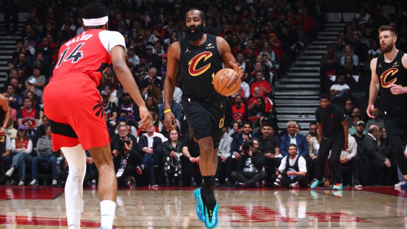 James Harden dribbles the ball up the court.
