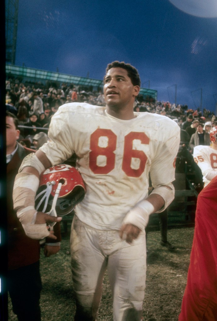 Buck Buchanan (center) of the Kansas City Chiefs walks off the field after a game circa 1968. 