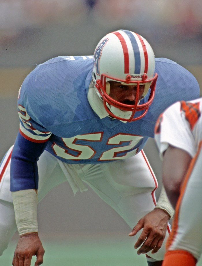 Robert Brazile of the Houston Oilers gets into his stance during a game against the Cincinnati Bengals on Sept. 12, 1982, at Riverfront Stadium in Cincinnati.