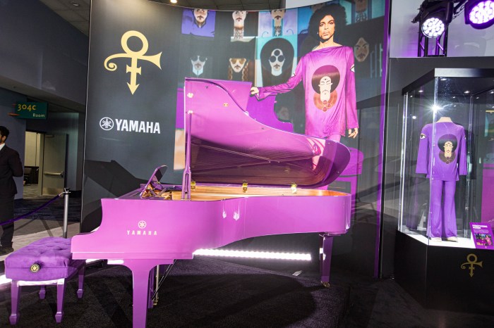 A custom purple Yamaha Grand piano used by Prince on stage is seen on display during The NAMM Show 2024 at Anaheim Convention Center on January 25, 2024 in Anaheim, California. The piano is on loan from Prince's estate.