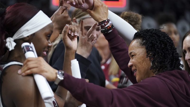 South Carolina head coach Dawn Staley (right) and guard Raven Johnson (left) huddle with the team after defeating Ole Miss at Colonial Life Arena on Feb. 22, 2026, in Columbia, South Carolina.