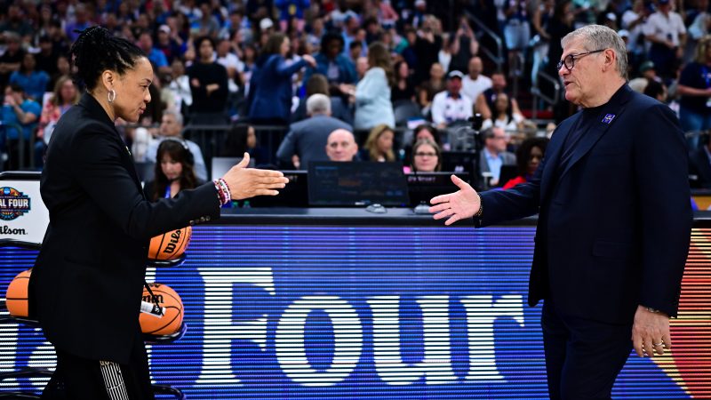 South Carolina head coach Dawn Staley (left) walks to shake hands with UConn head coach Geno Auriemma prior to their women's Final Four semifinal game on April 3, 2026, at Mortgage Matchup Center in Phoenix.