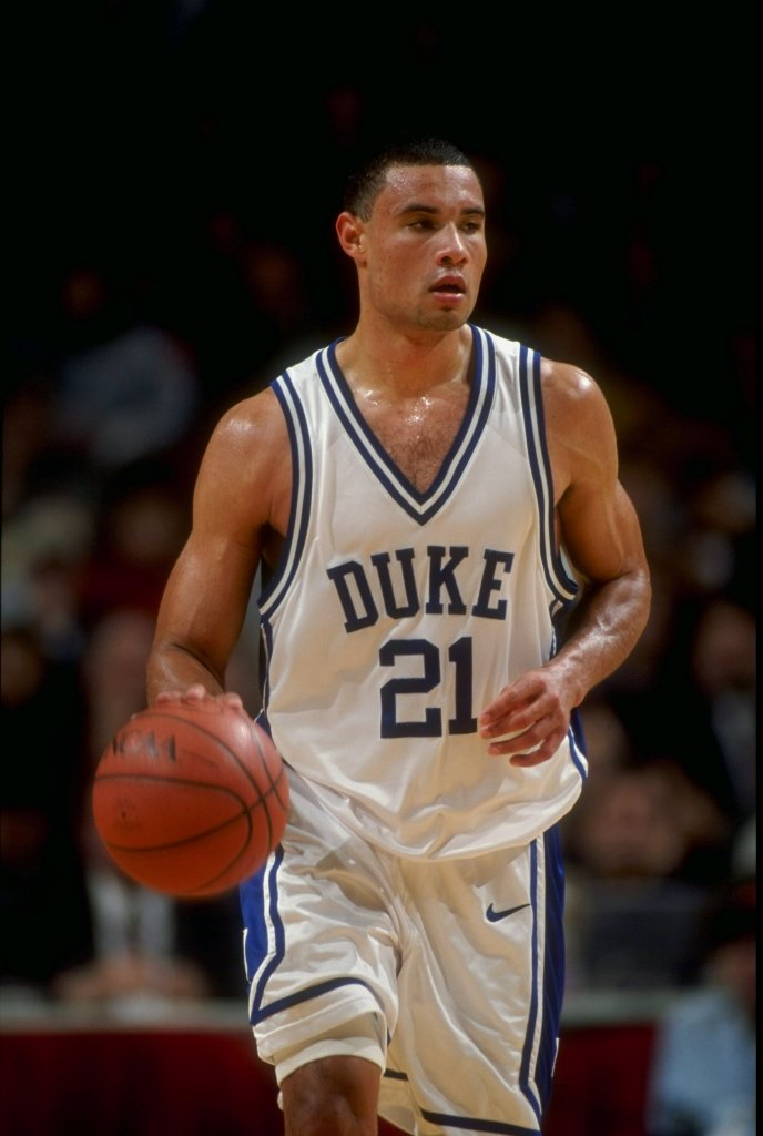 Trajan Langdon brings the ball up the court for Duke.