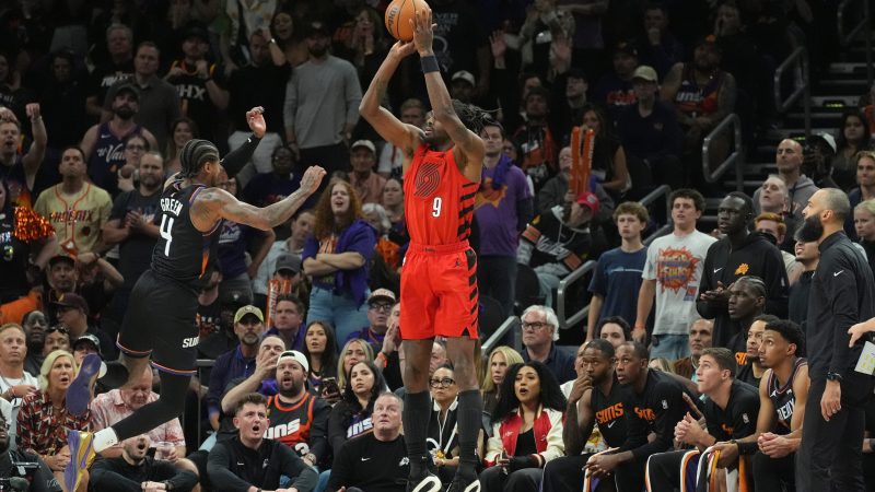 Jerami Grant shoots a 3-pointer