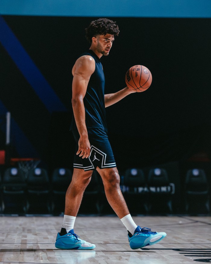 Cameron Boozer wearing Jordan Triangle sneakers