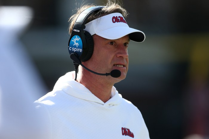 Lane Kiffin watches from the Ole Miss sidelines.