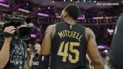Donovan Mitchell with back to camera celebrating Game 7 win.