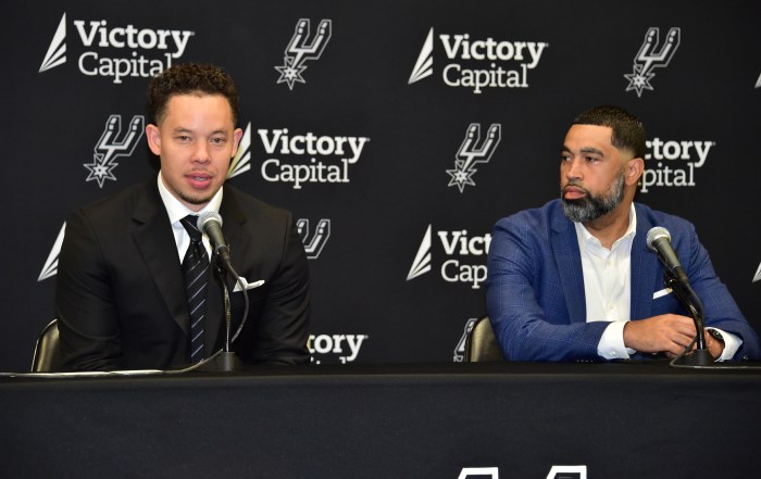 Mitch Johnson at a press conference with Brian Wright 