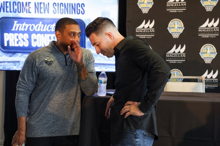Chicago Sky head coach Tyler Marsh (from left) speaks to general manager Jeff Pagliocca after introducing their new players during a a news conference on April 15, 2026, at The Metropolitan at Willis Tower in Chicago. 
