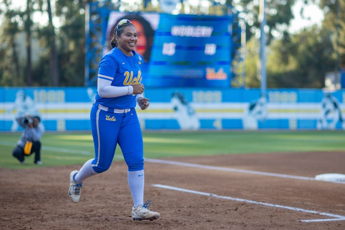 UCLA softball player Jordan Woolery takes the field before a Super Regional game against UCF on May 23, 2026, at Easton Stadium in Los Angeles. 