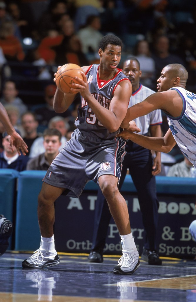 Jason Collins makes a move in the post.