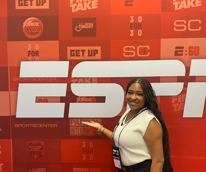 Morgan State student Raigan Lydon poses in front of an ESPN banner at the 2024 National Association of Black Journalists (NABJ) convention in Chicago.