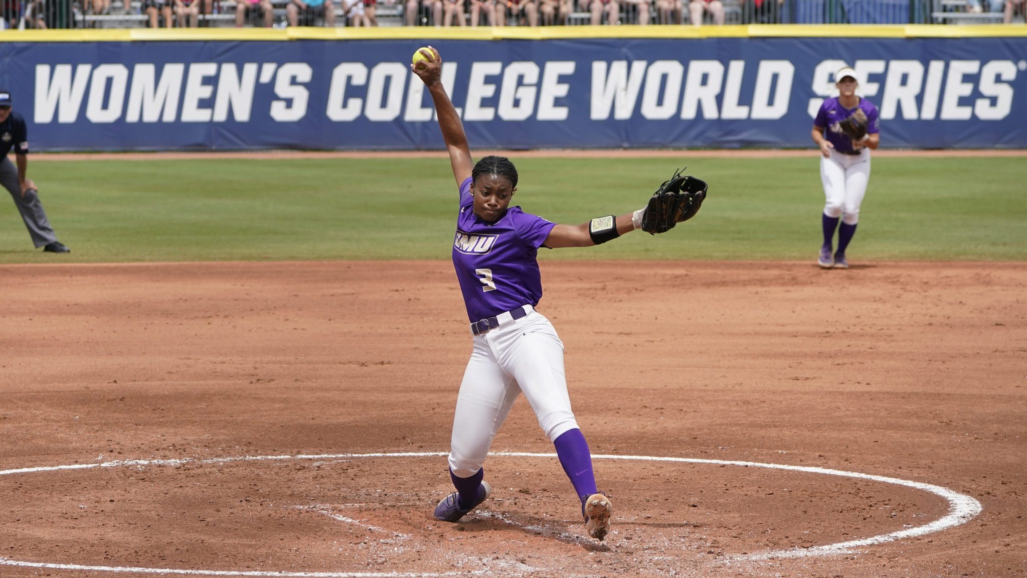 James Madison's Odicci Alexander pitches during a game against Oklahoma in the 2021 Women's College World Series in Oklahoma City.
