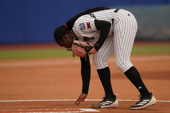 Texas Tech pitcher Nijaree Canady preps the mound during a game against Mississippi State on May 28, 2026 at the Women's College World Series in Oklahoma City.