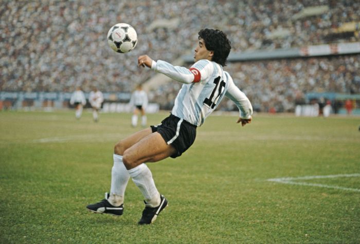 Argentina player Diego Maradona is shown wearing the Puma King cleats.