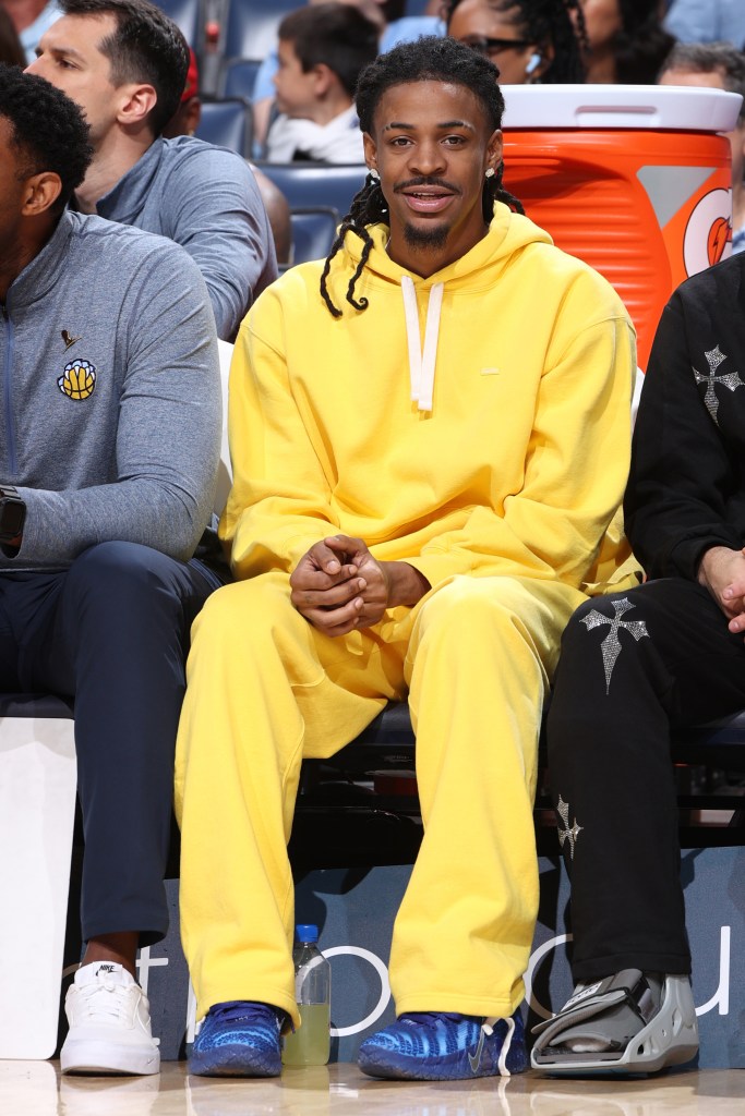 Ja Morant sitting on the sidelines wearing his Ja 3s during a Memphis Grizzlies game in the 2025-26 season