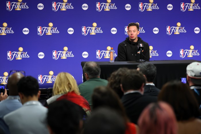 San Antonio Spurs coach Mitch Johnson speaks at his press conference after Game 4 of the NBA Finals
