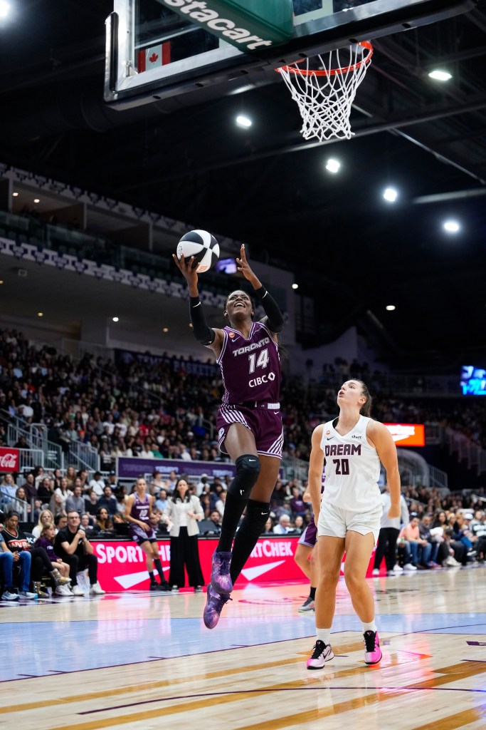 Toronto Tempo center Tèmítọ́pẹ́ “Tèmi” Fágbénlé drives to the basket during a game against the Atlanta Dream on June 14, 2026, at Coca-Cola Coliseum in Toronto. 