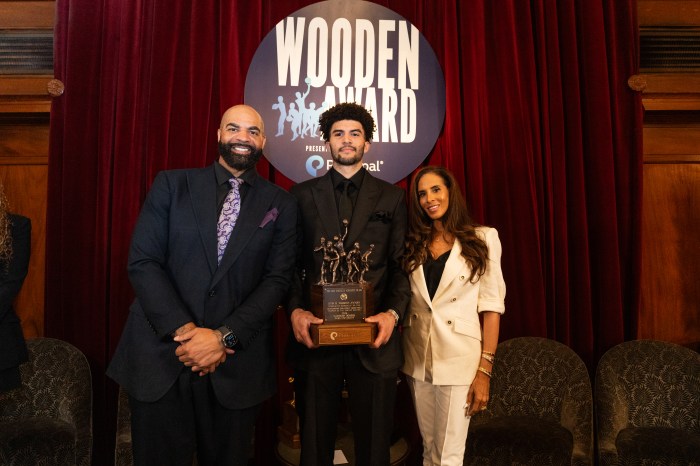 Carlos Boozer, Cameron Boozer and CeCe Boozer pose together after Cameron won the Wooden Award.