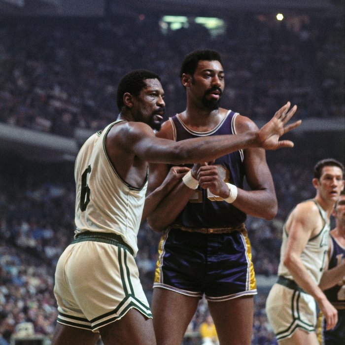 Bill Russell defends against Wilt Chamberlain
