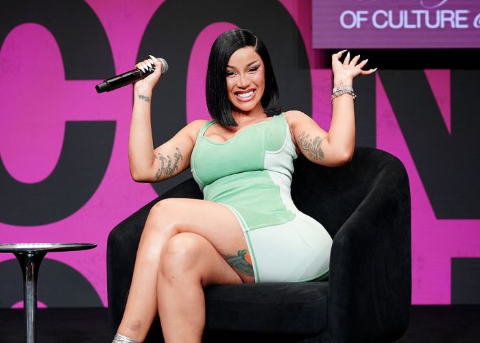 Cardi B speaks onstage during the 2026 Essence Festival