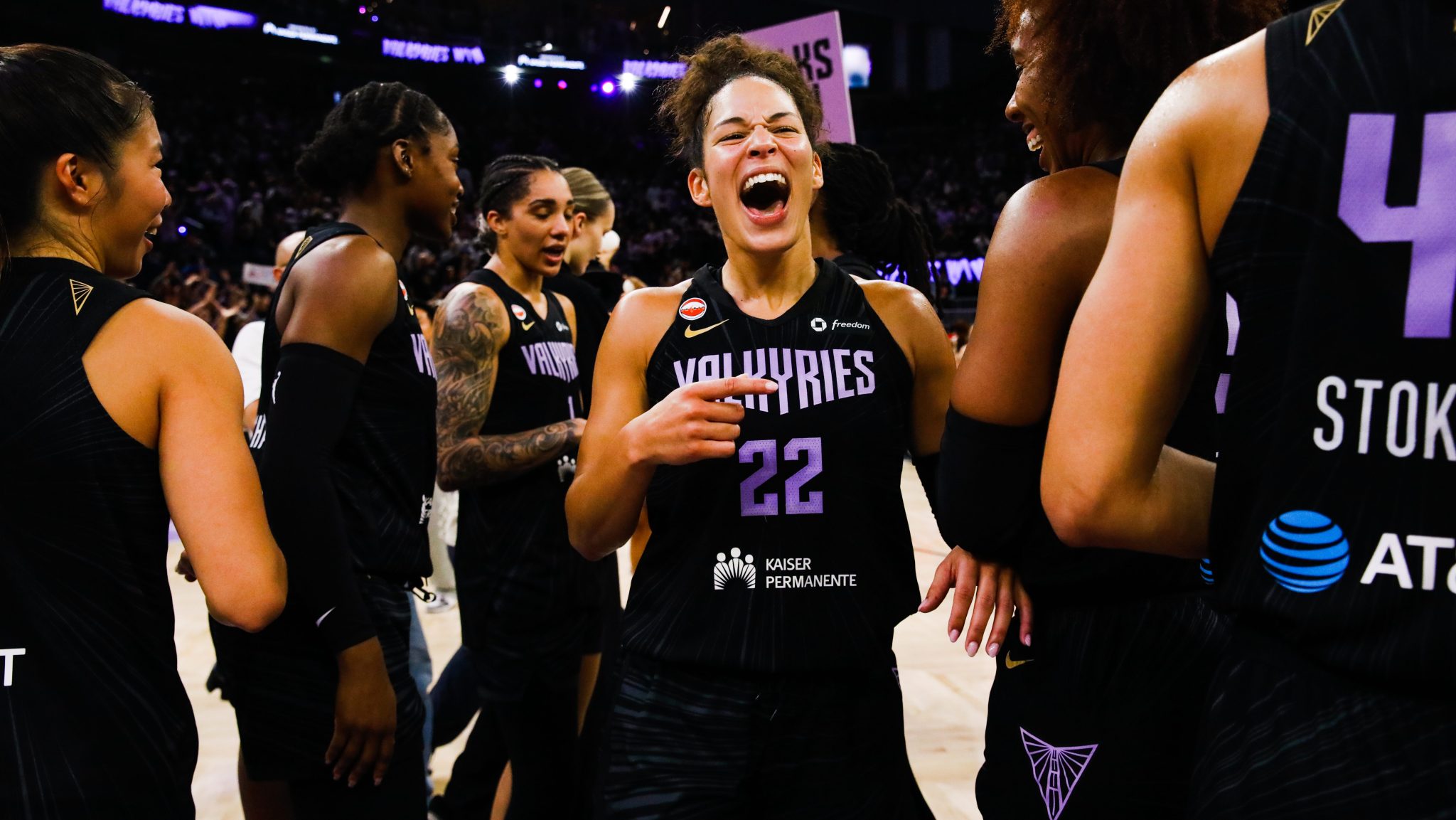 Golden State Valkyries guard Veronica Burton (center) shares a laugh with forward Kayla Thornton (right) after their win against the Washington Mystics at Chase Center in San Francisco on Saturday, July 18, 2026.