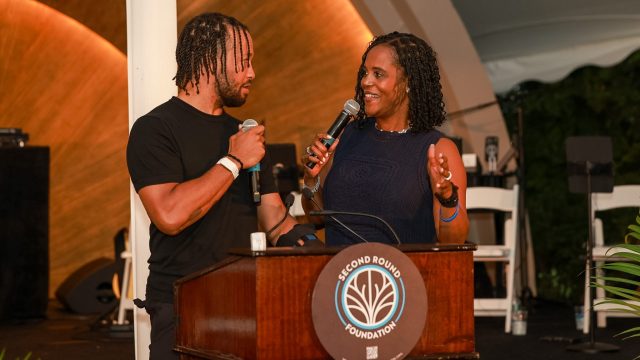 Jalen and Sandra Brunson address crowd at the Second Round Foundation