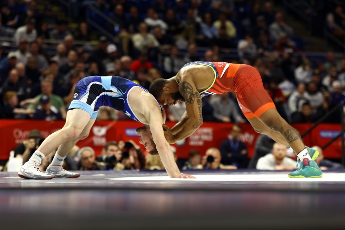 Jason Nolf and Jordan Burroughs wrestle in the men's freestyle