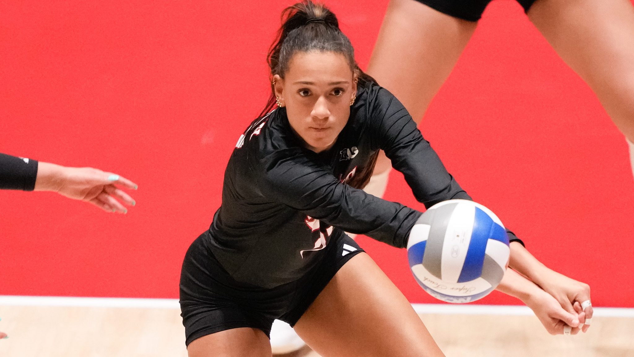 Nebraska's Harper Murray receives a serve against Wisconsin during a match on Oct. 31, 2025, at Wisconsin Field House in Madison, Wis.