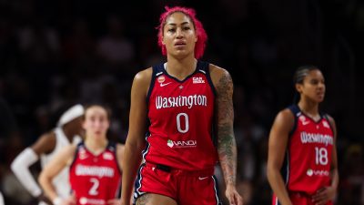 Shakira Austin (center) of the Washington Mystics walks up the court during a game against the Atlanta Dream on July 2, 2026, at CareFirst Arena in Washington, D.C.