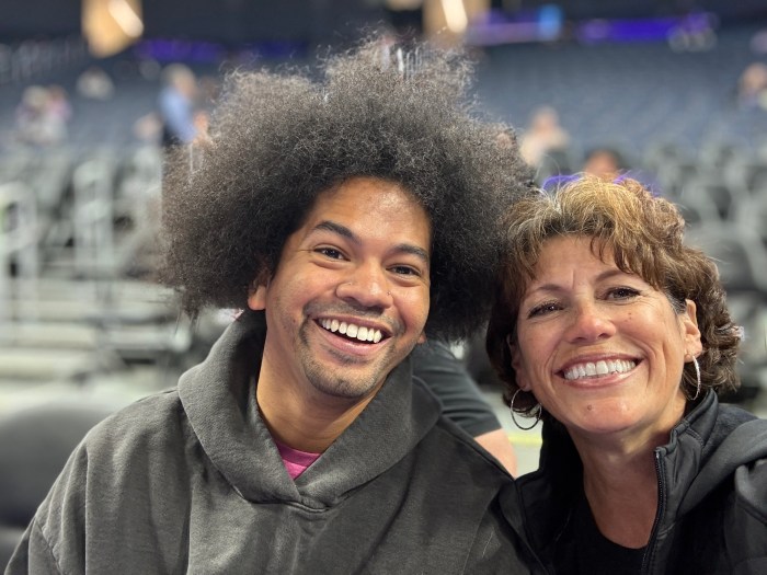 Mychal Threets (left) with his mother, Tessa Banuelos-Threets (right).