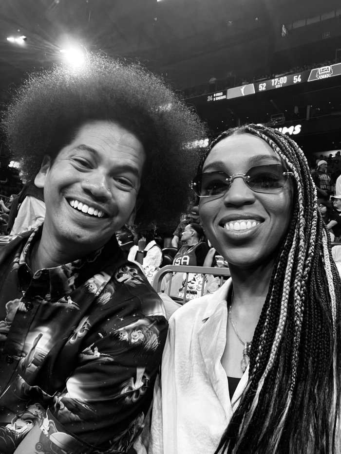 Mychal Threets (left) with Atlanta Dream co-owner Renee Montgomery (right).